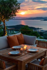 Obraz premium Outdoor dinner setting with wooden table candles and coastal sunset view for romantic dinner background and hospitality design