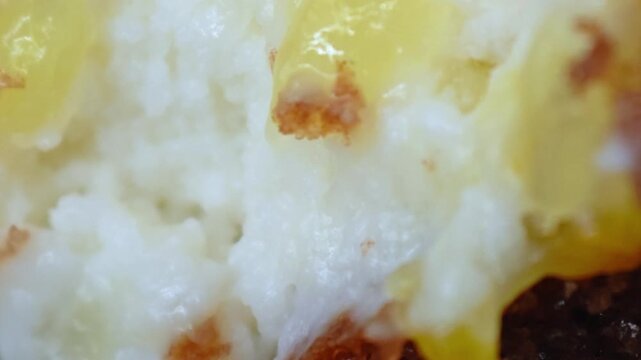 Texture of cake with cream as a close up background. Macro view cake. Bakery texture. 