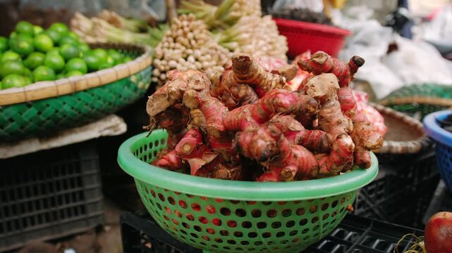 Close up of galangal root spice at a vietnam traditional street market stall in hanoi