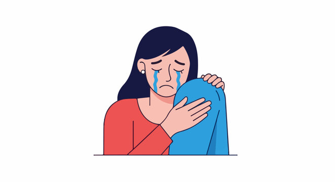 A woman in a red top cries with her knees to her chest