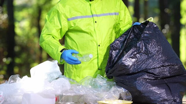 Garbage trash disposal helps restore ecosystems. Plastic trash collection makes a difference. Rubbish trash cleanup concept. Volunteers and trash waste recycling reduces pollution.