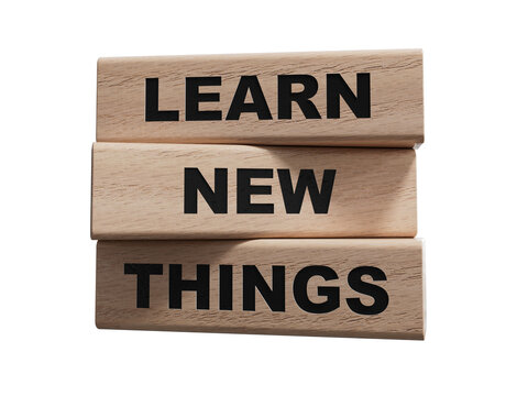 Learn new things symbol. Concept words Learn new things on wood cubes. Business and Learn new things concept. Copy space.Supports PNG files with transparent backgrounds.