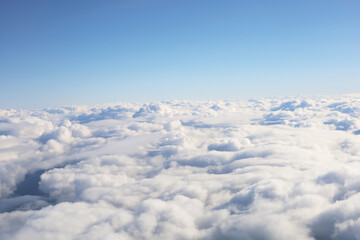 Fototapeta premium Fluffy white clouds seen from above.