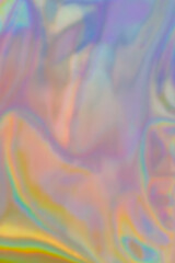 Fototapeta premium Colorful light reflections create a blurred pattern on a surface during daytime