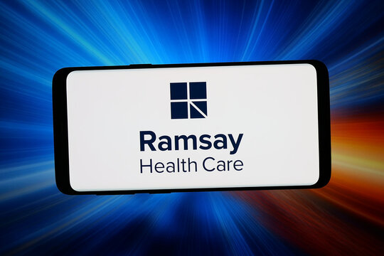 Stuttgart, Germany - 06-08-2026: In this photo illustration, the logo of Australian company Ramsay Health Care Limited is displayed on a smartphone in front of abstract background on computer screen.