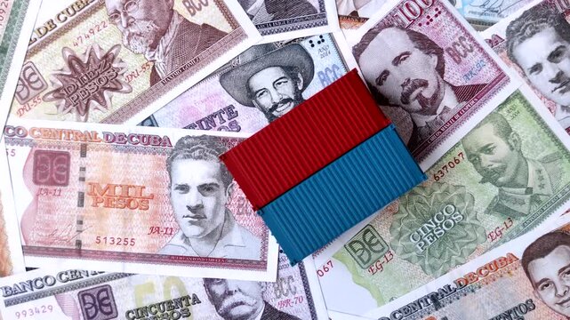 Cargo containers on the Cuba flag as a conceptual backdrop for goods export and logistics. Cargo containers on the Cuban flag as a background for your design
