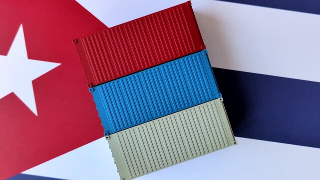 Cargo containers on the Cuba flag as a conceptual backdrop for goods export and logistics. Cargo containers on the Cuban flag as a background for your design