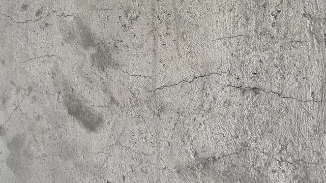 Rough Grey Cement Plaster Surface with Natural Cracks
