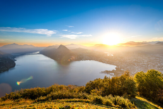 Sunset over Lake Lugano and Monte San Salvatore in Switzerland