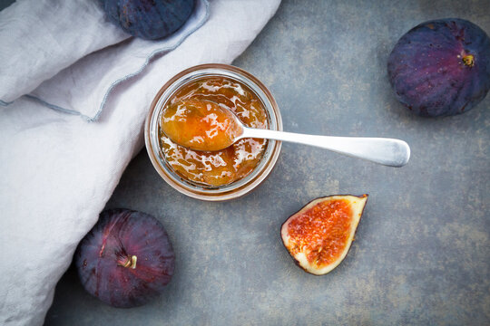Organic figs and a glass of fig jam