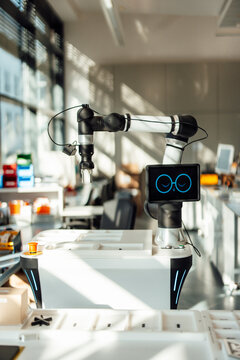Artificial intelligence robotic arm in a medical research laboratory