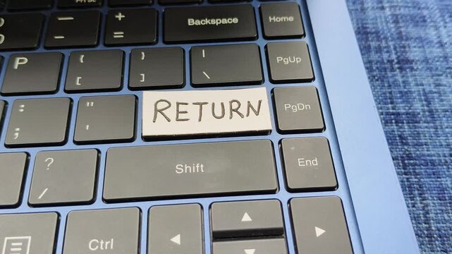 Key with return word written on laptop computer keyboard. Ecommerce business service, online purchase, shopping payment and product return policy concept. Closeup top spinning or rotation view.