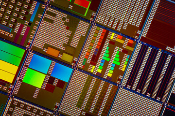 Silicon semiconductor wafer with integrated circuit die mosaic pattern.