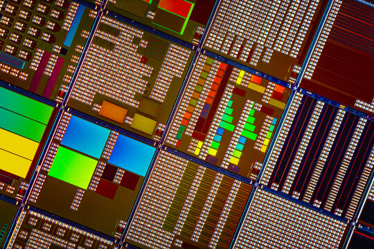 Silicon semiconductor wafer with integrated circuit die mosaic pattern.