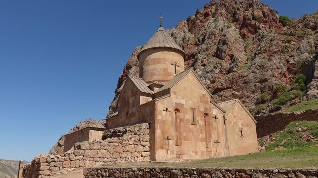 Noravank Monastery in Armenia surrounded by rocky mountains on a clear sunny day. Noravank monastery, located near the town of Yeghegnadzor in Armenia.