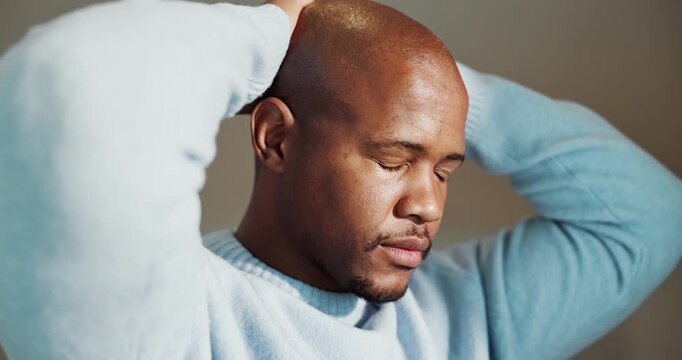 Serious, thinking and black man with stress in home for emotional burden, pressure or anxiety. Mental health, african person and overthinking in house for distressing news, reflection or overwhelmed