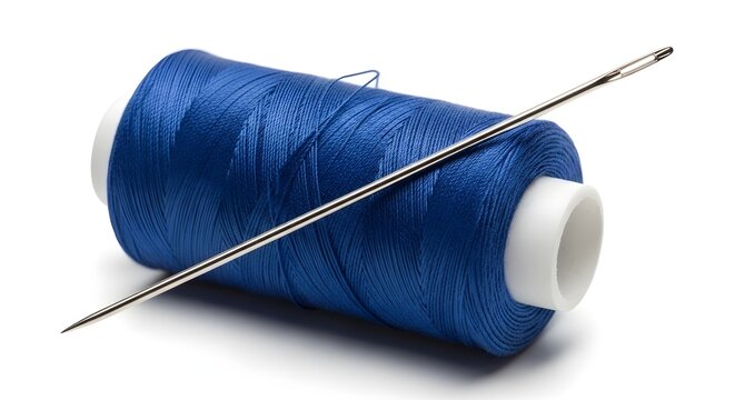 Blue sewing thread spool and needle isolated on white background