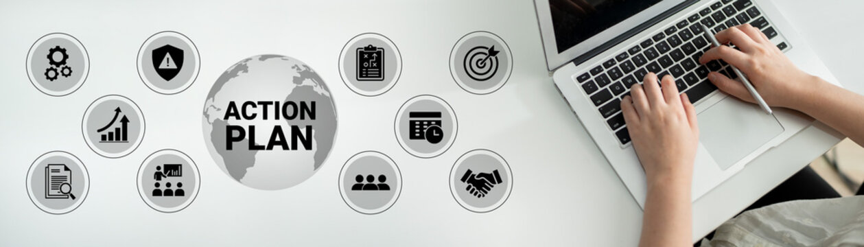 A top view of hands on a laptop creating a detailed action plan with icons representing essential business strategies for successful execution and growth in the modern workspace. Ledger