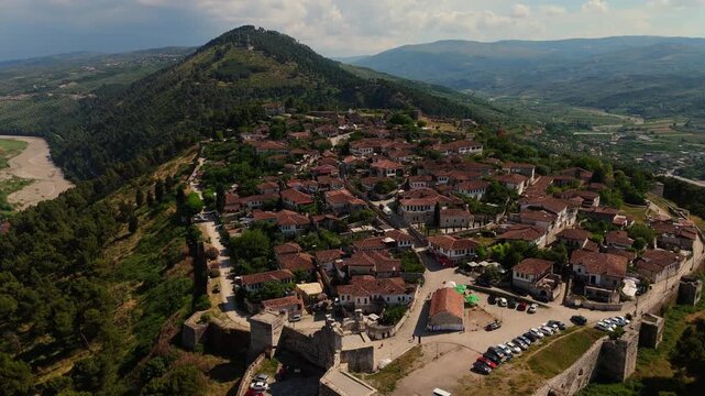 Aerial front drone view of the historic Berat Castle and fortress in Albania 
