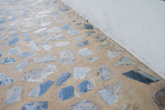 Paving stones on floor in park,Concept of laying paving slabs and pavers,Textured concrete for gray floors,Concrete pavement blocks,space for text.