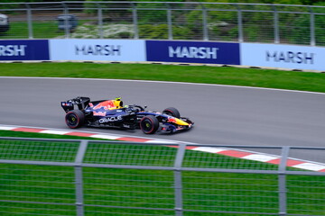 Naklejka premium May 24, 2025, Montreal, Canada: Red Bull Racing Formula 1 car during by Hadjar or Verstappen, demonstration run at Circuit Gilles Villeneuve. g.
