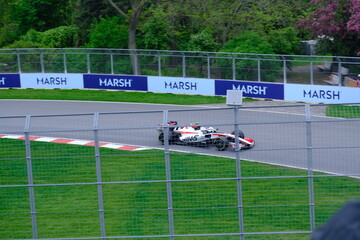 Naklejka premium May 24, 2026, Montreal, Canada - Haas Formula 1 car on track by Ocon and Bearman at Circuit Gilles Villeneuve. g.