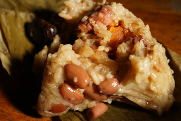 Obraz premium Macro Close Up of Traditional Taiwanese Zongzi Rice Dumpling with Peanuts and Meat
