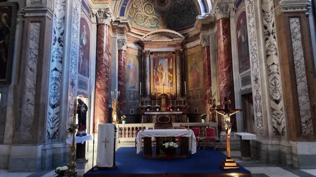 Main altar and cross inside Santa Maria in Monticelli church in Rome
