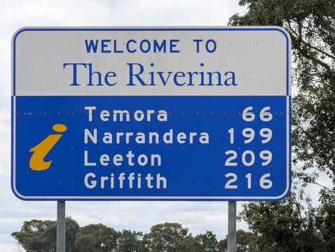 A close up view of a 'Welcome To The Riverina' road  sign on a highway in New South Wales, Australia.
