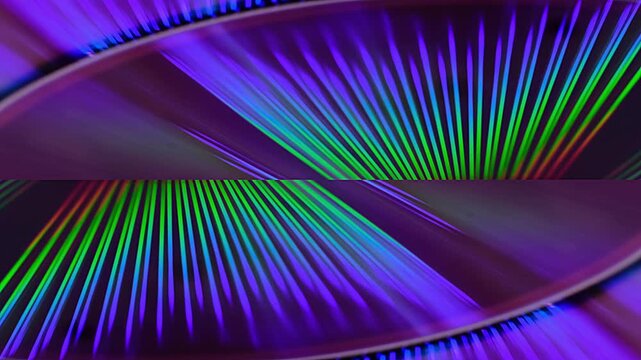 Reflection of the surface of a DVD discs, multiple optical discs stacked on top of each other like fish scales, colorful lines on the surface are caused by thin-film interference and diffraction