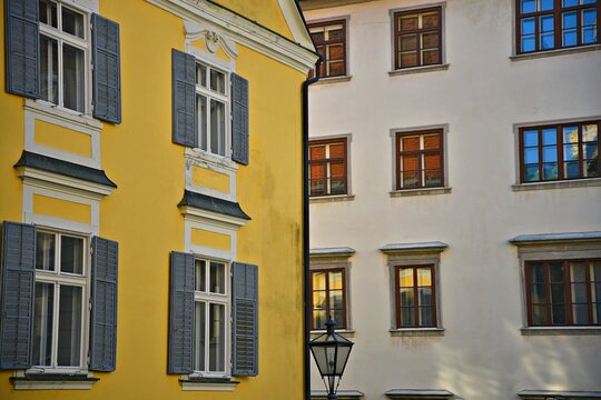 Cityscape with scenic view of two Neo-Classical style buildings facade in Graz the capital of Styria, Austria.