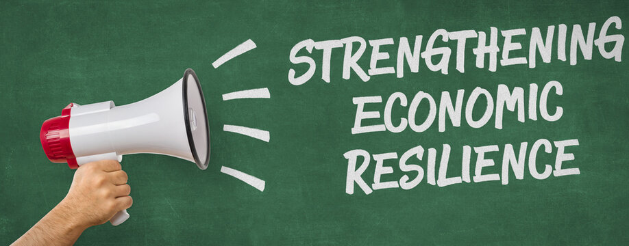 A man holding a megaphone - Strengthening Economic Resilience