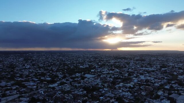 aerial drone view of mar del plata coastline and city traffic, cinematic aerial drone footage of mar del plata, argentina. ocean coastline, city buildings, residential neighborhoods and moving traffic