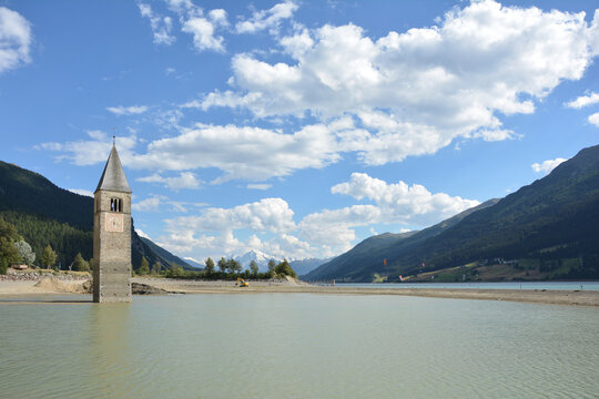 Old bell tower of the sunken church of Graun / Curon,  in lake Reschen / Resia, South Tirol, Italy