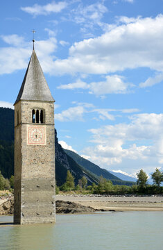 Old bell tower of the sunken church of Graun / Curon,  in lake Reschen / Resia, South Tirol, Italy