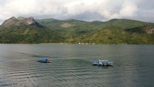 Aerial drone footage of Saco do Mamangu&aacute; highlighting Sugarloaf Peak, Paraty, Brazil