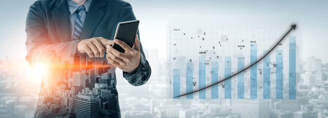 A focused businessman stands in an urban setting using a tablet to analyze data against a backdrop of a financial growth chart, showcasing modern economics. Impute © InfiniteFlow