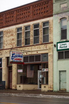 Vintage laundromat in old downtown Escanaba, Michigan, January 2021