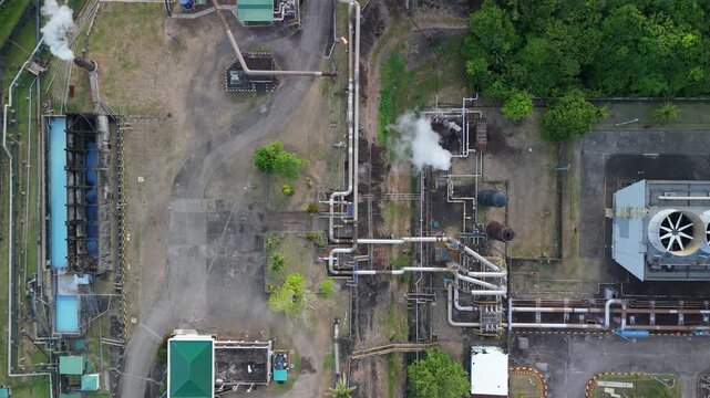 High angle shot shows a wellpad geothermal power plant located in Tabaco City, Philippines. Ideal for educational and corporate concepts.