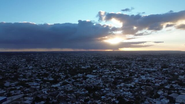 aerial drone view of mar del plata coastline and city traffic, cinematic aerial drone footage of mar del plata, argentina. ocean coastline, city buildings, residential neighborhoods and moving traffic