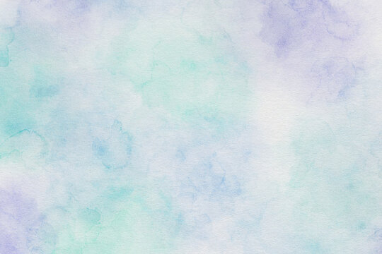 Watercolor abstract background with soft blue and lavender hues. Dreamy artistic texture feels airy and delicate and perfect for elegant design projects.