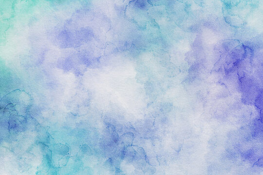 Watercolor abstract background with blue turquoise and violet tones. Vibrant artistic texture feels fresh and dreamy and perfect for modern creative projects.