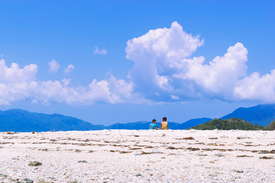 Tropical white sand on a sunny day at Alad Island. Romblon, Philippines