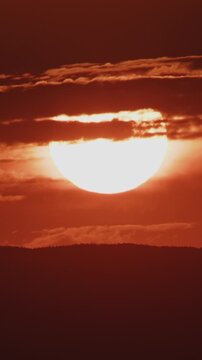 Extreme Closeup of Red Sunrise Timelapse Zoom Out Vertical Video