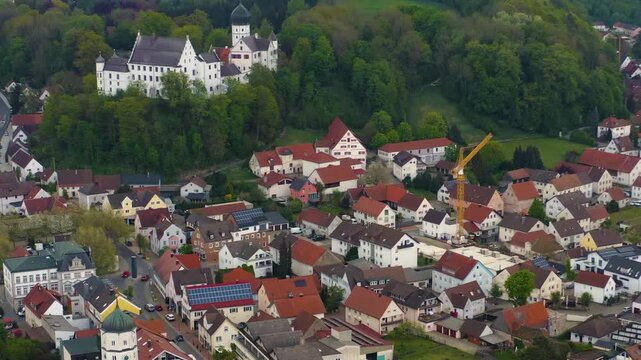 Aerial view of the city Illertissen Iller and castle V&ouml;hlinschloss in Germany on a cloudy spring day 