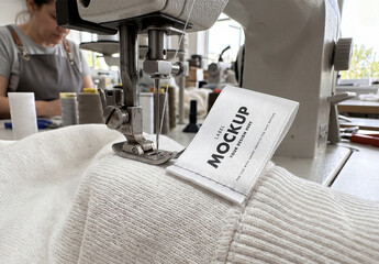 Woven Clothing Label Mockup Close Up on Sewing Machine