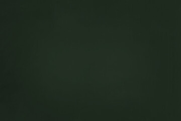 Fototapeta premium A clean full-frame texture of a blank green school chalkboard or blackboard. Minimalist dark green background 