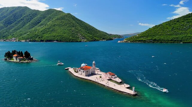 Aerial view of islands in the Bay of Kotor, featuring Our Lady of the Rocks Church and the Saint George Benedictine Monastery, Montenegro.
