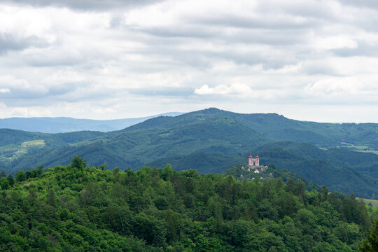 calvary banska stiavnica slovakia baroque church on a green hill surrounded by mountains landscape travel and tourism destination