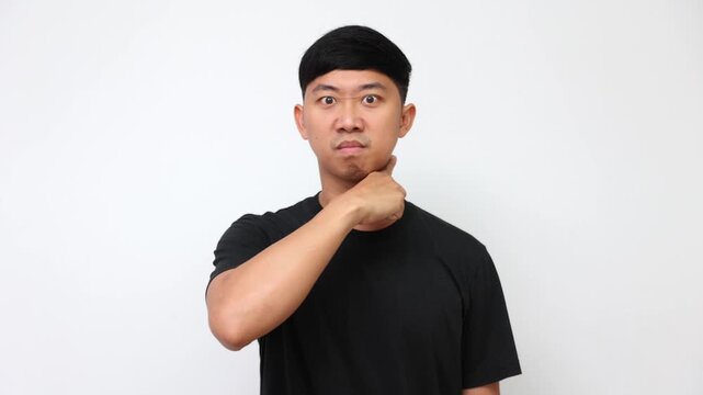Asian Man Expressing Anger and Threatening Gestures